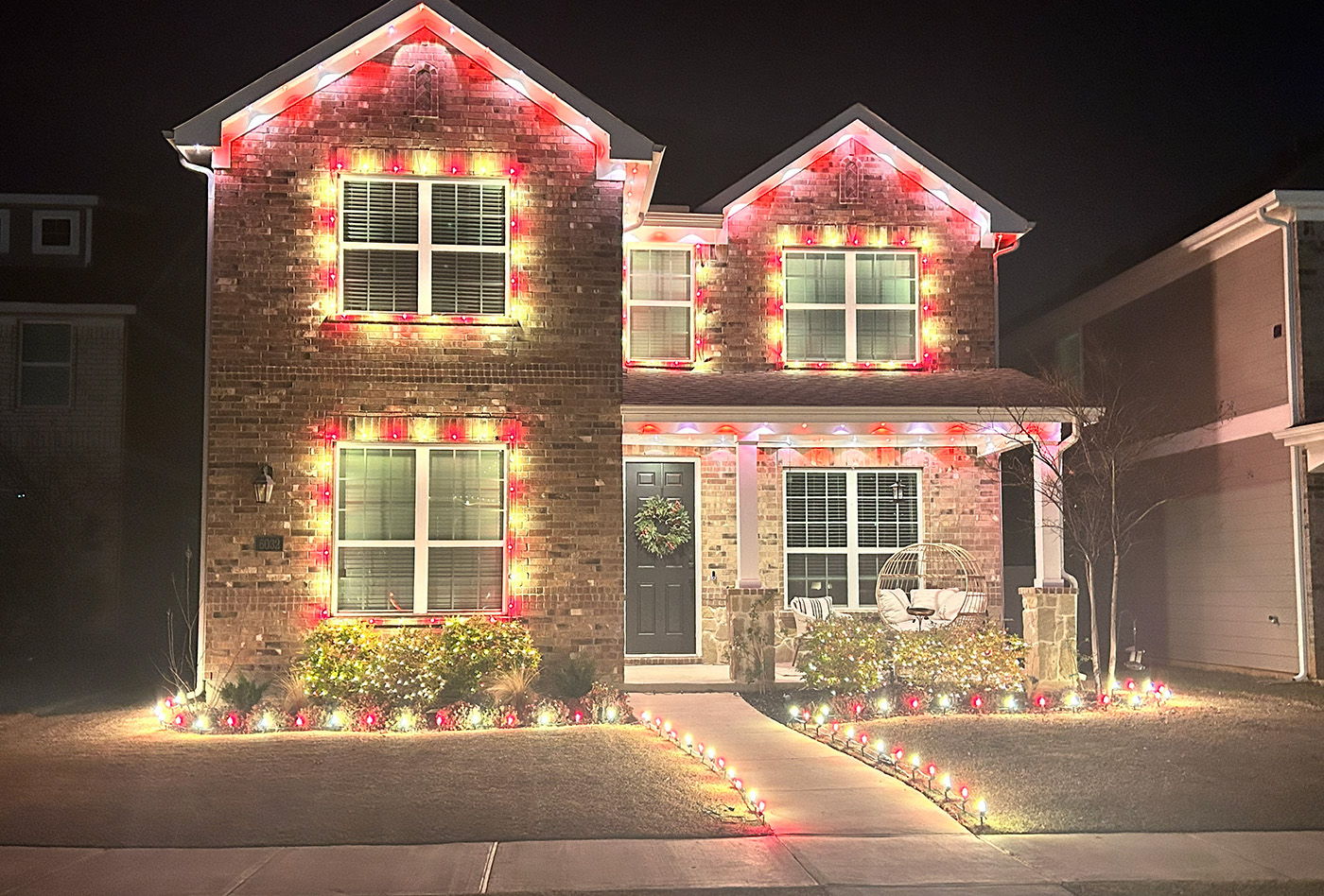 Christmas lights installed on a home
